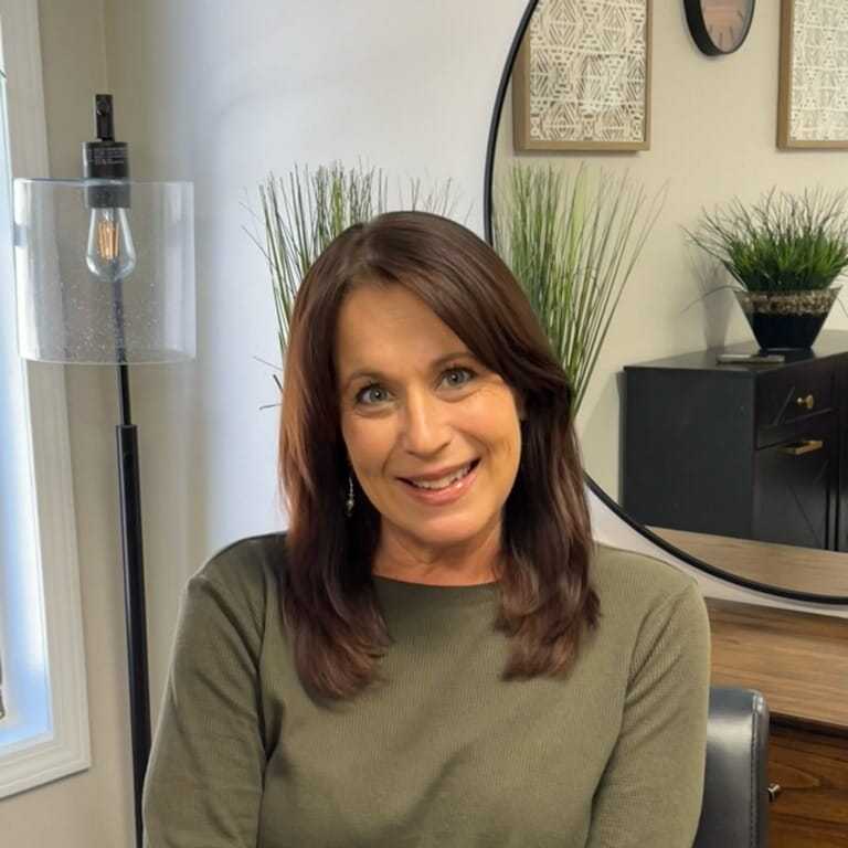 Portrait of Lorna's Studio, a professional stylist at Integrity Hair Studios, showcasing their expertise and style.